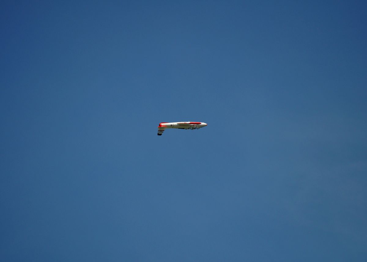 'Plane in Blue Sky flying upside down' Poster, picture, metal print ...