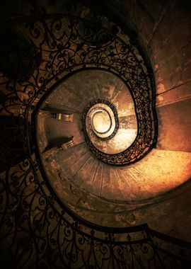 Old spiral staircase in brown and orange tones