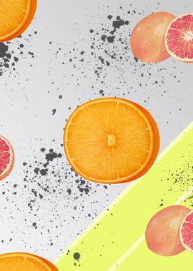 Oranges and grapefruit on a green and grey background.