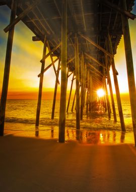 Sunset Through The Pier