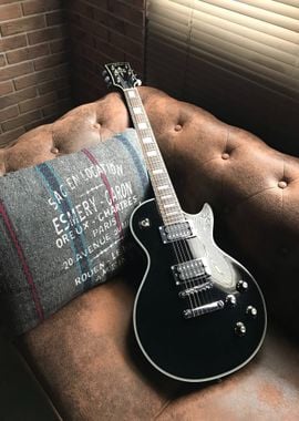 blakc guitar brown sofa