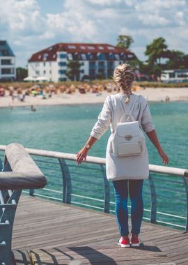 Woomen On Pier Near Beach