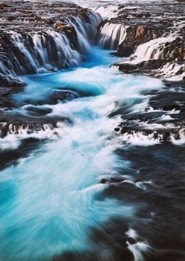 Waterfall by Mountains