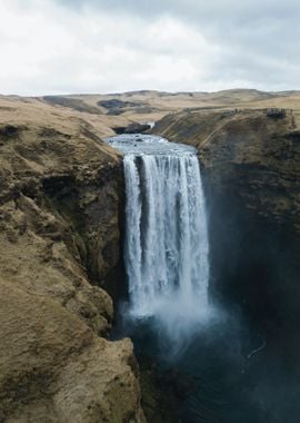 Waterfall by Mountains