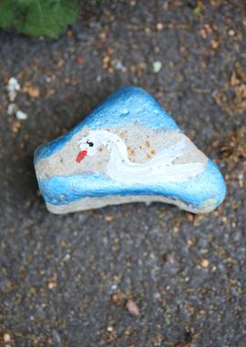 Kids drawing on stones