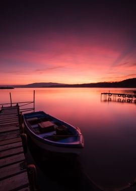 Sunset on lake sea boat