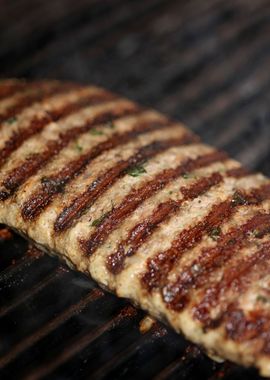 Meat baking on Greek grill