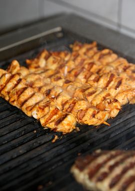 Meat baking on Greek grill