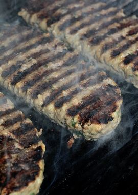 Meat baking on Greek grill