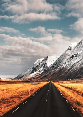 Empty highway by Mountains