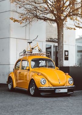 yellow Volkswagen beetle 