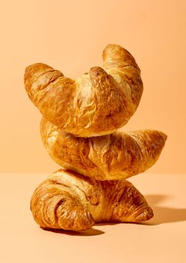 baked croissants on orange