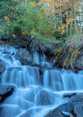 Waterfall in Autumn Forest