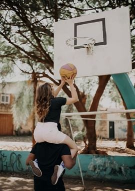 Couple Playing Basketball