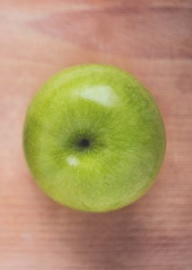 Green Apple on Wood