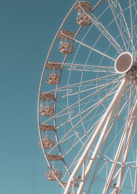 Ferris Wheel Against Blue Sky