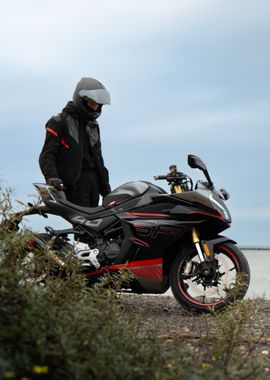 Motorcycle with rider at sea