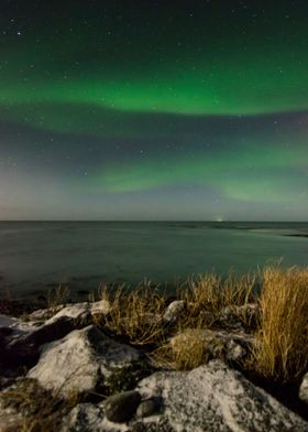 Northern lights by the sea
