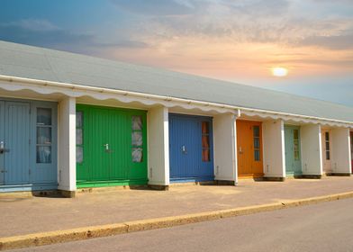 row of beach huts bournemouth dorset Uk