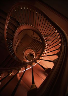 Spiral staircase in chocolate tones