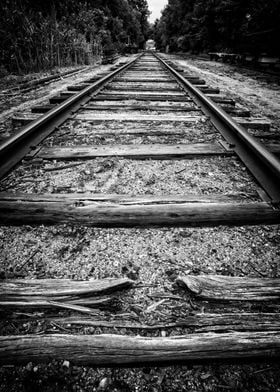Old worn train tracks vanishing in the distance.   Fine ... 
