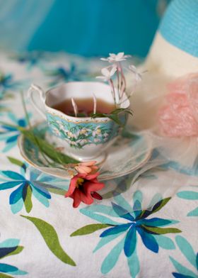 Vintage teacup and saucer adorned with Harlequin flower ... 