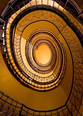 Spiral staircase in brown and orange tones