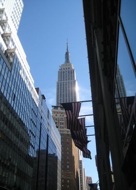 Empire state building, American flag.