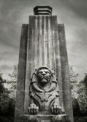 Sentinel. One of the two twin Lion statues at the entra ... 