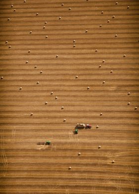 Field of hay being farmed
