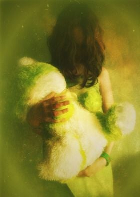 Childhood Friend Color photograpg of a little girl hug ... 