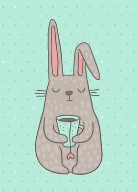 Cute cartoon bunny drinking tea