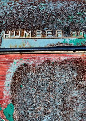 Rusting Red Humber 80 Automobile