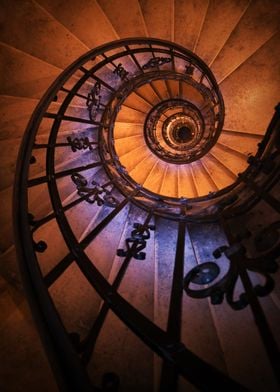 Ornamented spiral staircase in blue and orange tones
