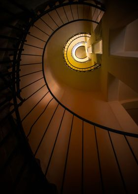 Modern spiral staircase in brown and yellow