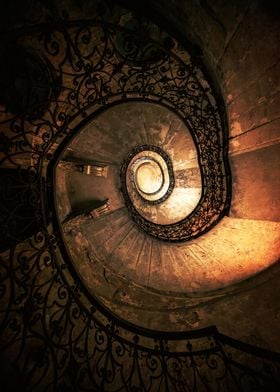 Old spiral staircase in brown and orange tones