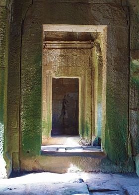 Sunlight streaming into one of the stone doorway passag ... 
