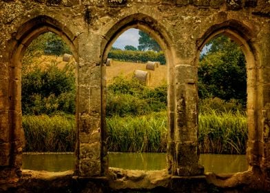 "A View Over The Moat" through the castle window shows  ... 