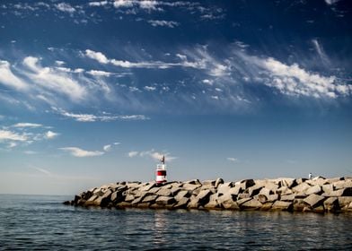 A small lighthouse as you exit the Alvor harbour in por ... 