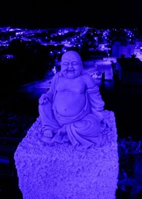 "Blue Buddha and The Blue City"  The Blue Buddha sits,  ... 