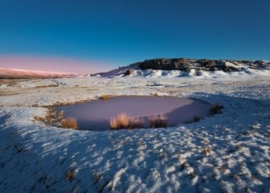 Frozen pool on the Brecon Beacons, South Wales