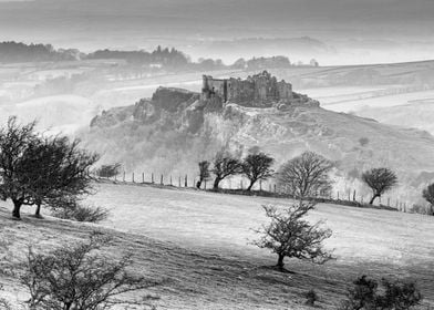 Carreg Cennen castle sits high on a hill near the River ... 