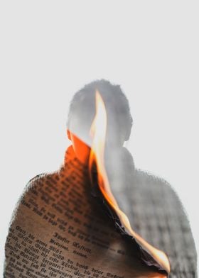 Double exposure image of silhouette of a woman and burn ... 