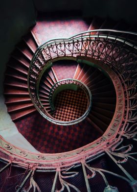 Spiral stairs in red and brown tones
