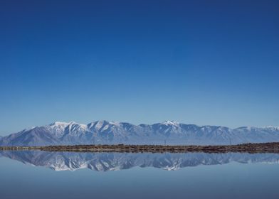 The Wasatch Mountains reflected in the still waters of  ... 