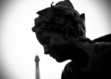 Statue in Paris , Eiffel Tower in the background