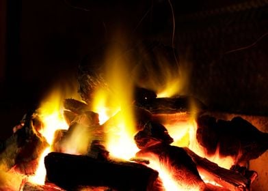 Photograph of charcoal pieces and fire flames