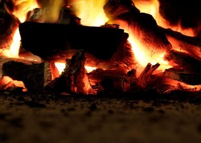 Photograph of charcoal pieces and fire flames