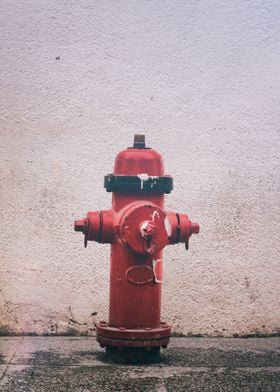 Photograph of a red rusty hydrant