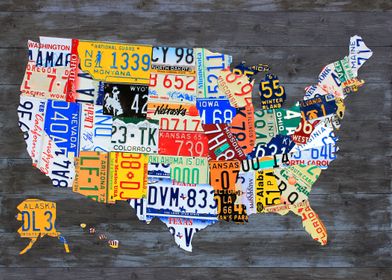 License Plate Map of the USA on Gray Wood Planks.